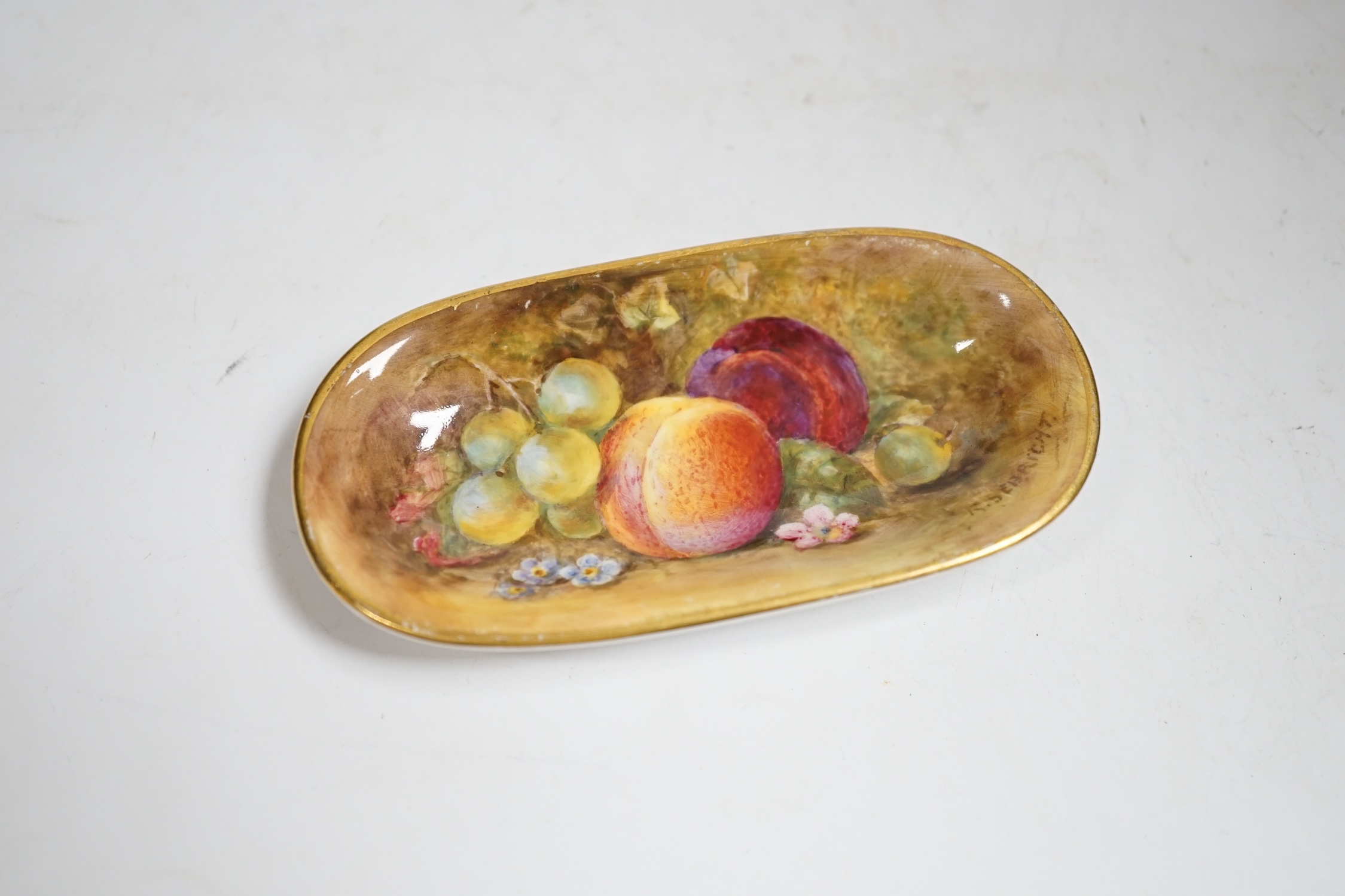 A Royal Worcester fruit painted pin dish by Richard Sebright, 10.5cm wide. Condition - good